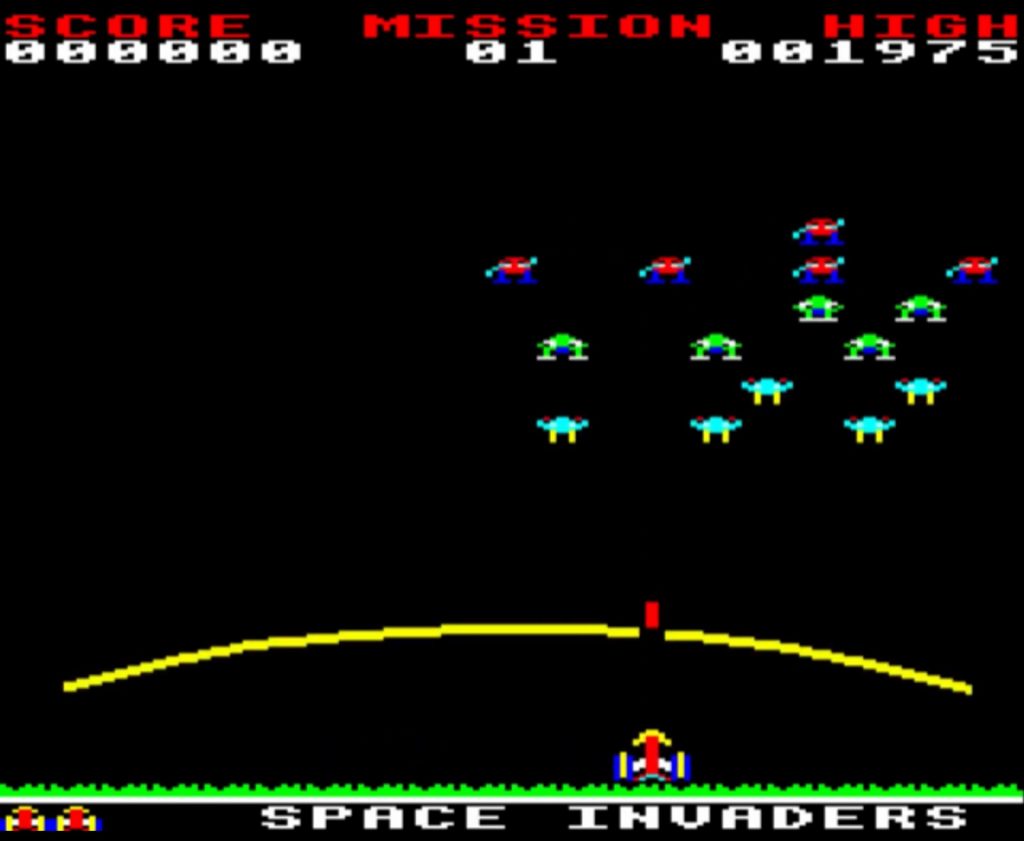 Gorf on the BBC Micro: the Space Invaders mission, with rows of aliens above a yellow force field and the player ship